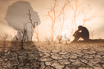 concept of global warming and drought People sat mourning over the drought. A world without water...