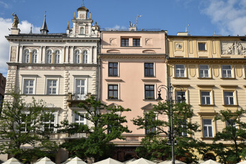Fototapeta na wymiar Façades de la Grand Place de Cracovie. Pologne