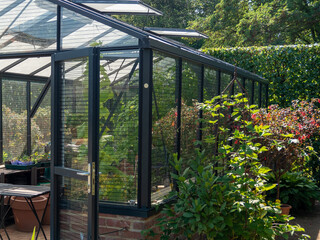 The interior of a home greenhouse for growing vegetables.