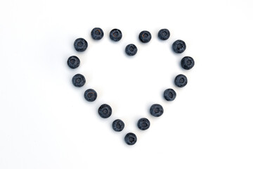 heart of blueberries isolated on white background