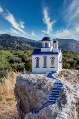 Small greek church on rock near zia, kos island, greece - obrazy, fototapety, plakaty