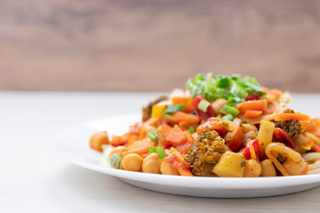 Pasta with tomato sauce, chickpeas pasta with chickpeas and vegetables. vegetarian food