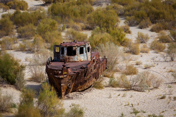 Fototapeta na wymiar Cemetery of forgotten ships in Muynak. Aral Sea . Uzbekistan