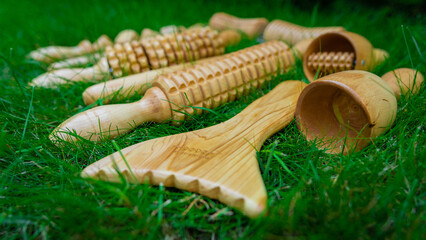 Maderotherapy tools on grass