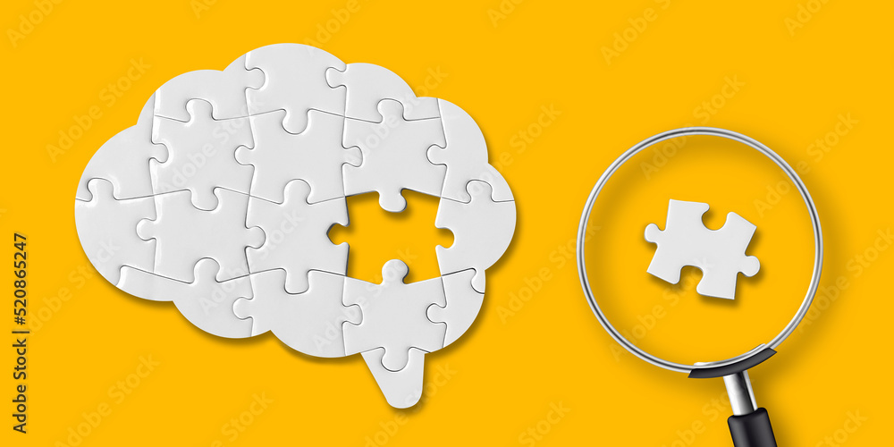Aufkleber brain shaped white jigsaw puzzle on yellow background. searching missing piece of the brain puzzle w