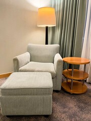 Hotel room chair with the lamp interior