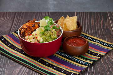 Chicken Burrito Bowl served in a dish isolated on mat side view of fastfood on wooden background