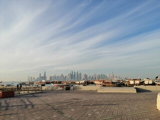 Fototapeta na wymiar Doha Skyline with old traditional boats Qatar 