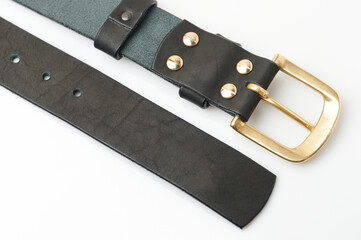 Brown leather belt with golden buckle