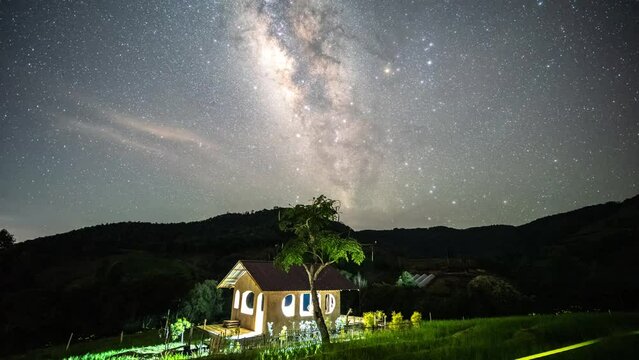 The Milky Way stretches along a hut in the outback of Chiang Mai.