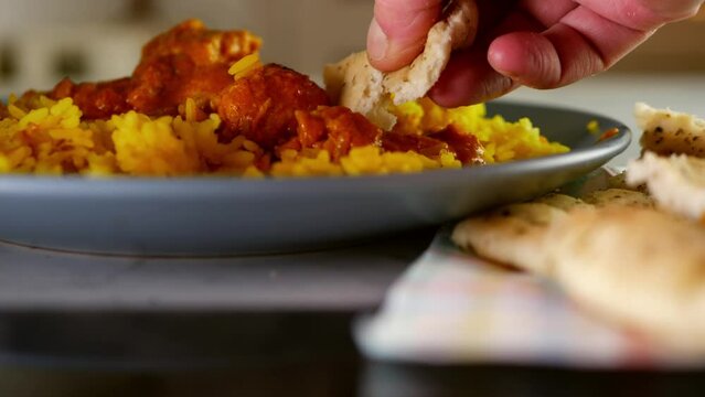 Chicken Korma curry with Pilau rice and naan bread