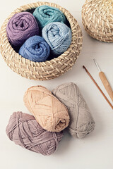 Craft hobby background with yarn in natural colors. Recomforting hobby to reduce stress for cold...