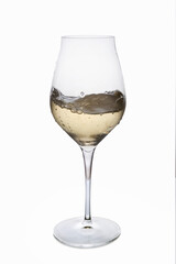 glass of white wine on white background