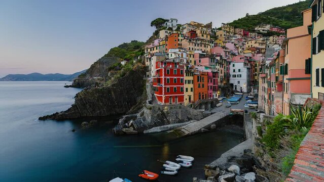 Panoramic Sunrise Time Lapse of beautiful town of Riomaggiore in Cinque Terre, Riomaggiore, Liguria, Italy