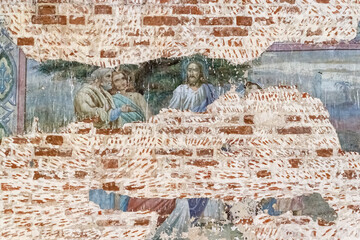 pictures on the wall of an abandoned temple