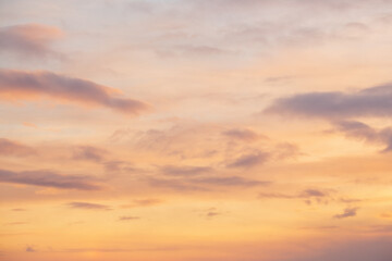 Beautiful sunset sky background with clouds. Scenic cloudscape.
