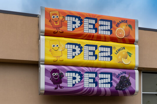 PEZ Visitor Center in Orange, Connecticut. Dedicated to all things PEZ. Sign with giant PEZ candy, orange, lemon, and grape. 
