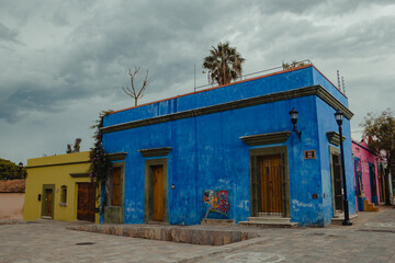 Oaxaca city streets with few tourists on a rainy afternoon