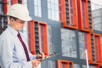 Engineer under checking the industry cooling tower air conditioner of large industrial building to...