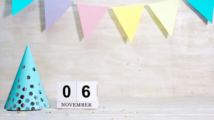 Birthday November 6  on the calendar. Happy birthday card with date copy space. Holiday decorations...