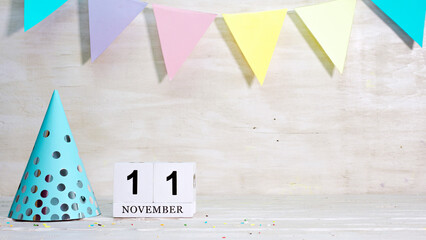 Birthday November 11 on the calendar. Happy birthday card with date copy space. Holiday decorations...
