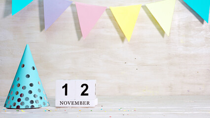 Birthday November 12 on the calendar. Happy birthday card with date copy space. Holiday decorations...