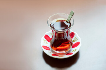 A glass of Turkish black tea