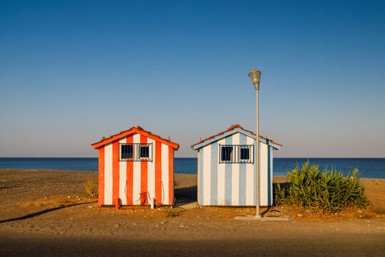 Two colorful booths at Afandou sea beach in Rhodes, Greece, Europe.