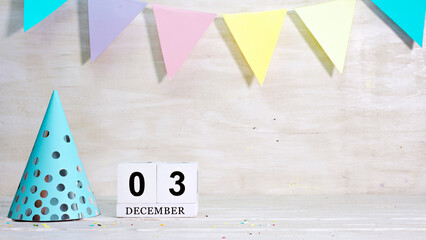 Birthday December 3 on the calendar. Happy birthday card with date copy space. Holiday decorations...