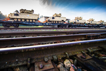 Obraz premium Pabrade/Lithuania October 21, 2019 US Army's 1st Armoured Battalion of the 9th Regiment, 1st Division from Fort Hood in Texas Bradley is unloaded as they arrive at the Pabrade railway station.