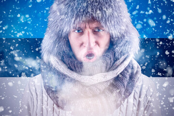 Isolate. Cold weather. Bask. A man in a fur hat and scarf warms his hands with his mouth. It's...