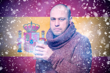 Isolate. Cold weather. Bask. A man in a fur hat and scarf warms his hands with his mouth. It's...