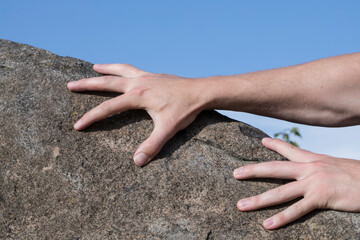 Hands concept. Stone. Motivation. Hope. Help. Photo. Sky background. 
