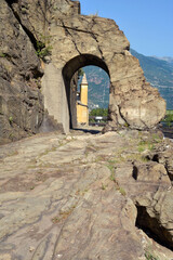 Donnas, Aosta, Aosta Valley, -07-18-2022- The ancient Roman route named Via delle Gallie and its Arch