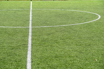 centre line of an artificial turf soccerll field. Sports concept