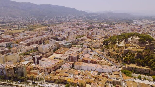 Aerial view of Denia, Alicante, Spain. Summer tourist destination, city. 4k