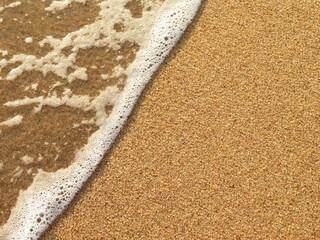 texture of sand with sea wave