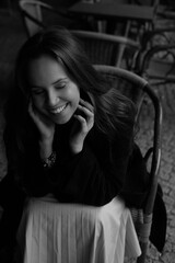 Sensual portrait of a young happy brunette 