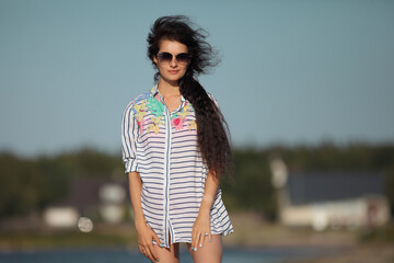 Beautiful woman enjoying summer outdoors