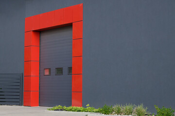 Rolling gate or roller shutter with application to factory, warehouse or hangar. Exterior. High...