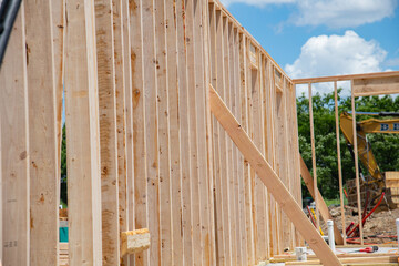 Residential american home in under construction beams house wooden frame house