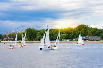training on sailboat, competition on yachts, yachting training, yacht club on water. boat sailing...