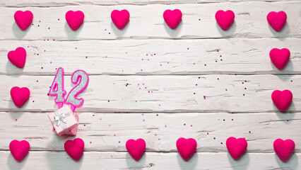 Happy birthday card for a girl in pink shades, top view, copy space. Beautiful congratulations with...