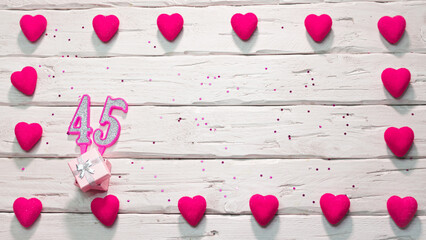 Happy birthday card for a girl in pink shades, top view, copy space. Beautiful congratulations with...