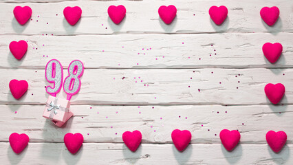 Happy birthday card for a girl in pink shades, top view, copy space. Beautiful congratulations with...