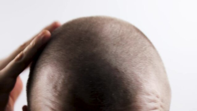 The Short haircut for men. Short hair on the head of a man.Layout, male haircut option.Standard original short haircut.