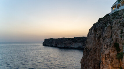 Atardecer en las costas de Menorca, Islas baleares - 520909887