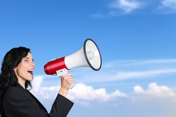 Young woman hold scream in megaphone announces discounts sale