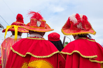  Men, women and children, members of the cultural group Chegança dos Marujos, dance and sing in...