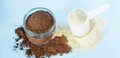 two types of collagen powder isolated on blue background, beauty, skincare and wellness concept, healthy life ingredients